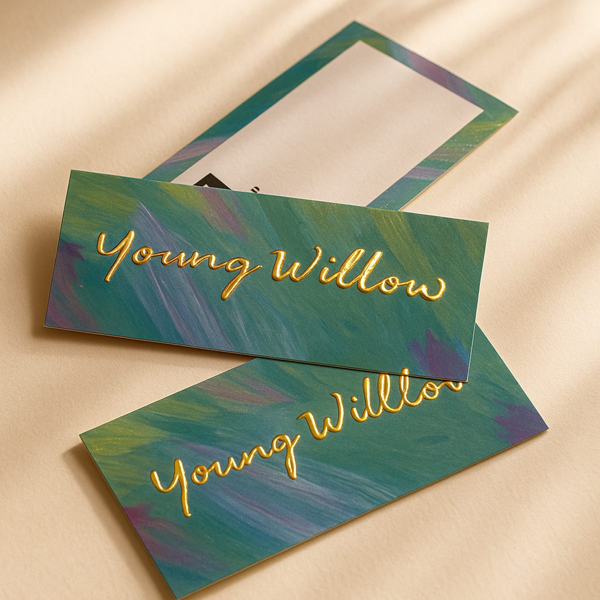 Gold foil business cards with Young Willow design